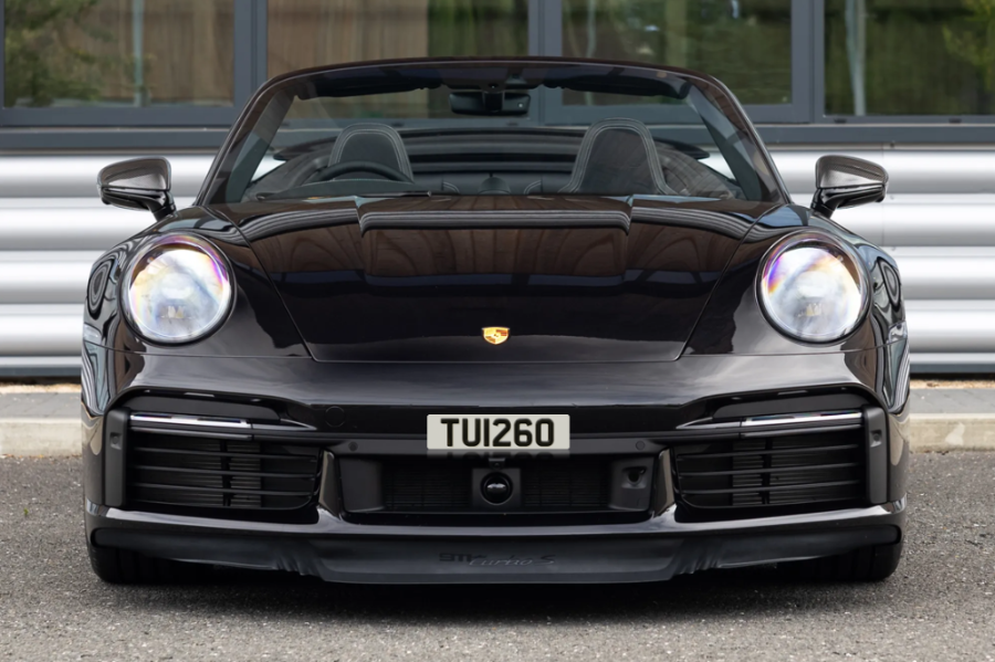 Black Porsche with UKPLATESELLER license plate