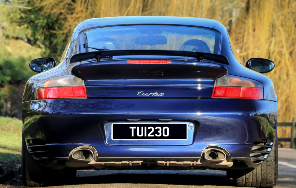Car containing number plate TUI230